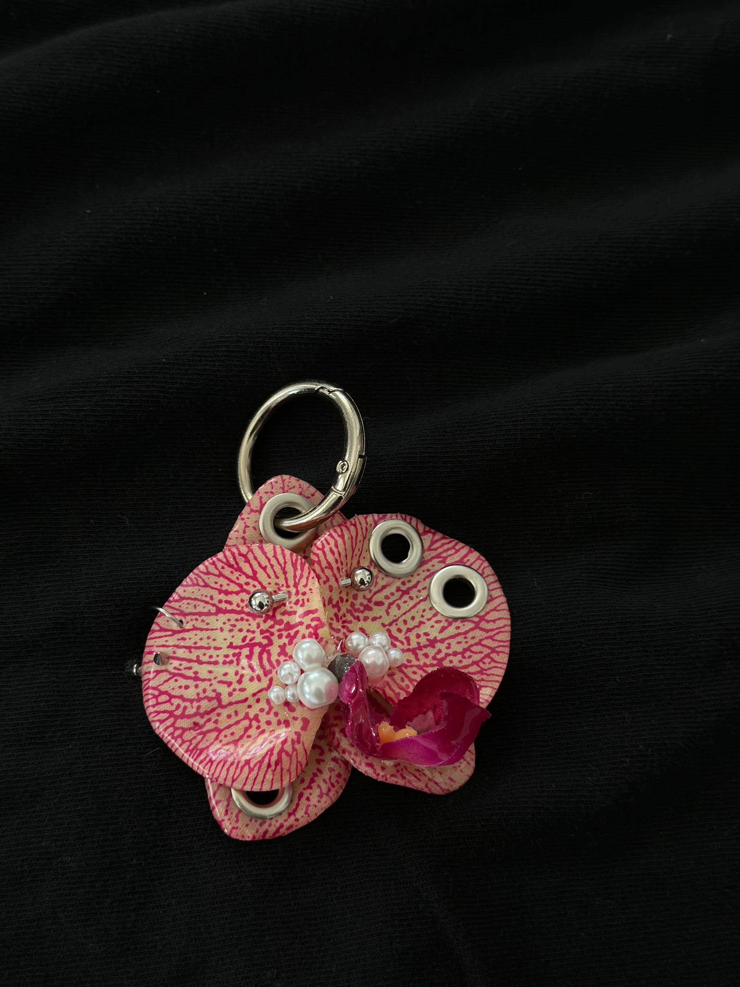 Pink Pierced orchid keychain with silver hardware