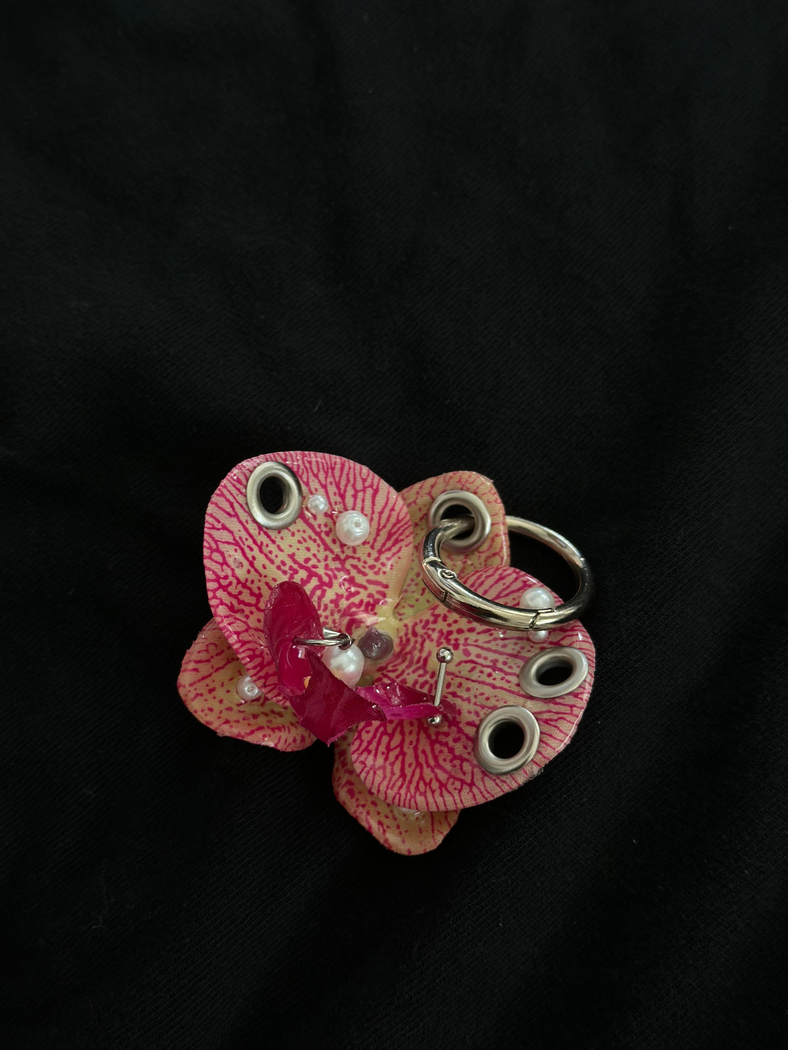 Pink Pierced orchid keychain with silver hardware