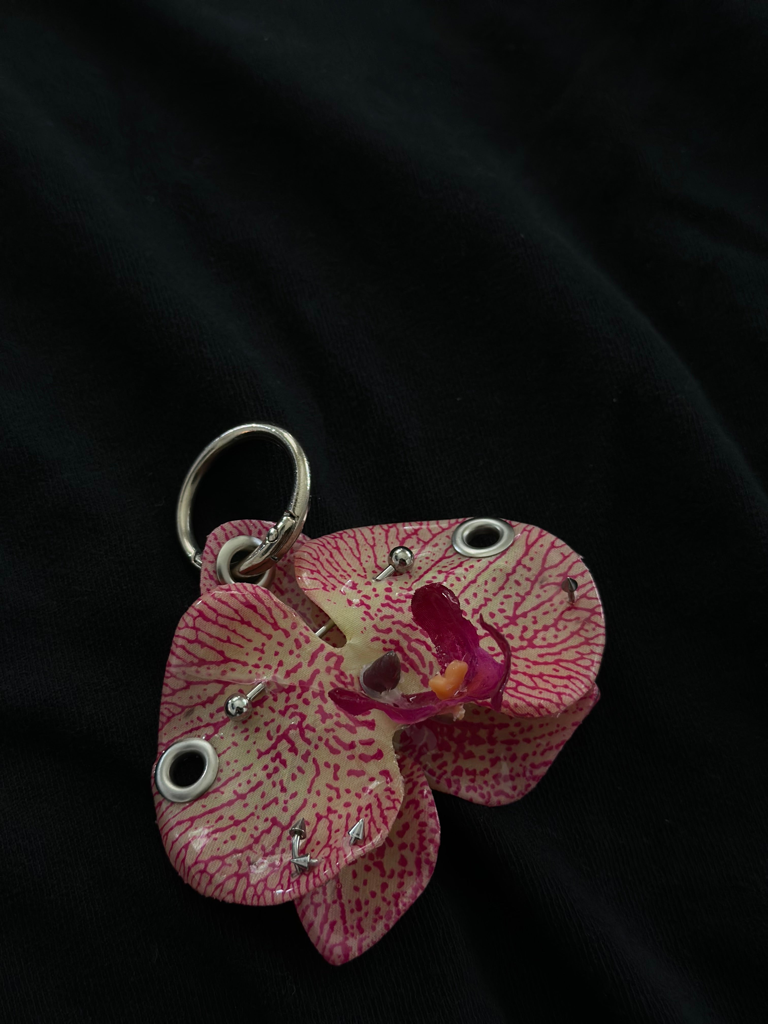 Pink Pierced orchid keychain with silver hardware